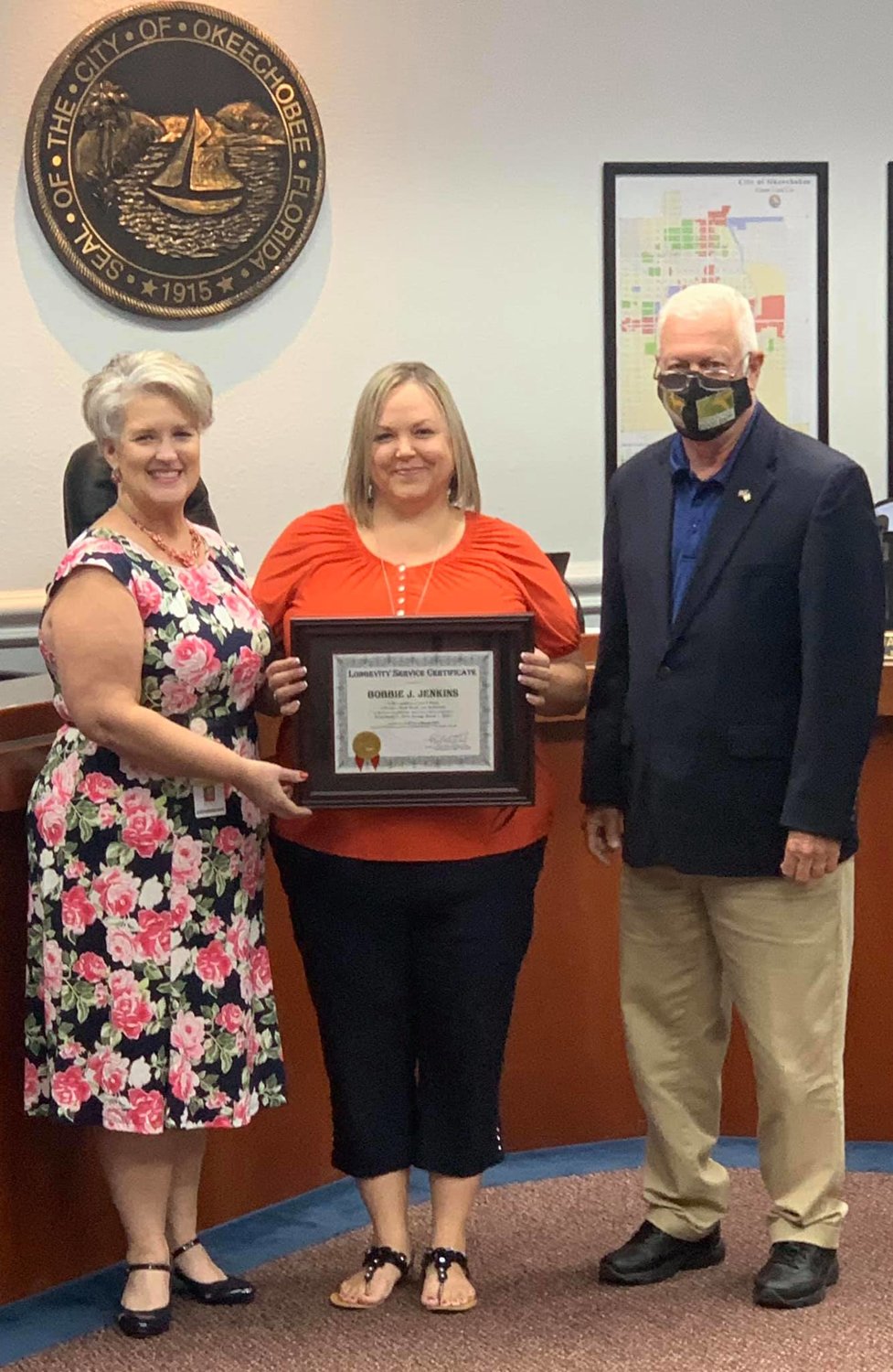 Deputy City Clerk Bobbie Jenkins (center) was honored with a 5-Year Longevity Service Award presented by Mayor Watford and City Clerk Lane Gamiotea at the March 2, 2021 City Council meeting.